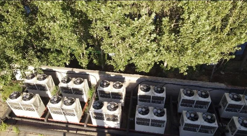 助力唐山两小区清洁供暖，九州酷游空气能践行“双碳”担当